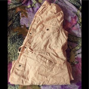 Pink jacket/ cover up.